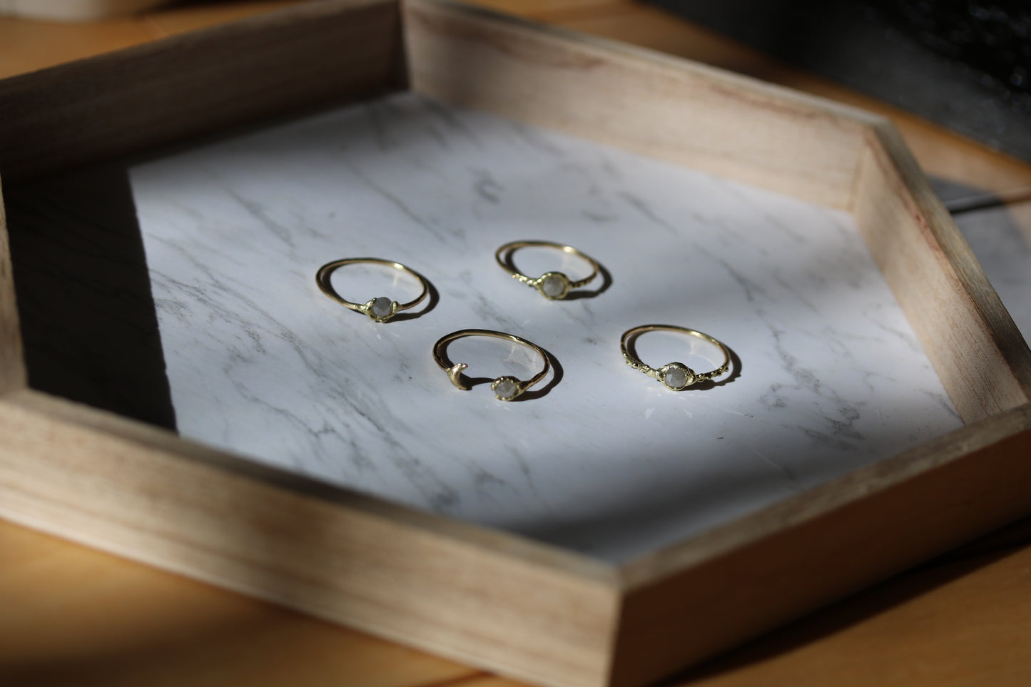 stacking 18k gold ring with gray diamond