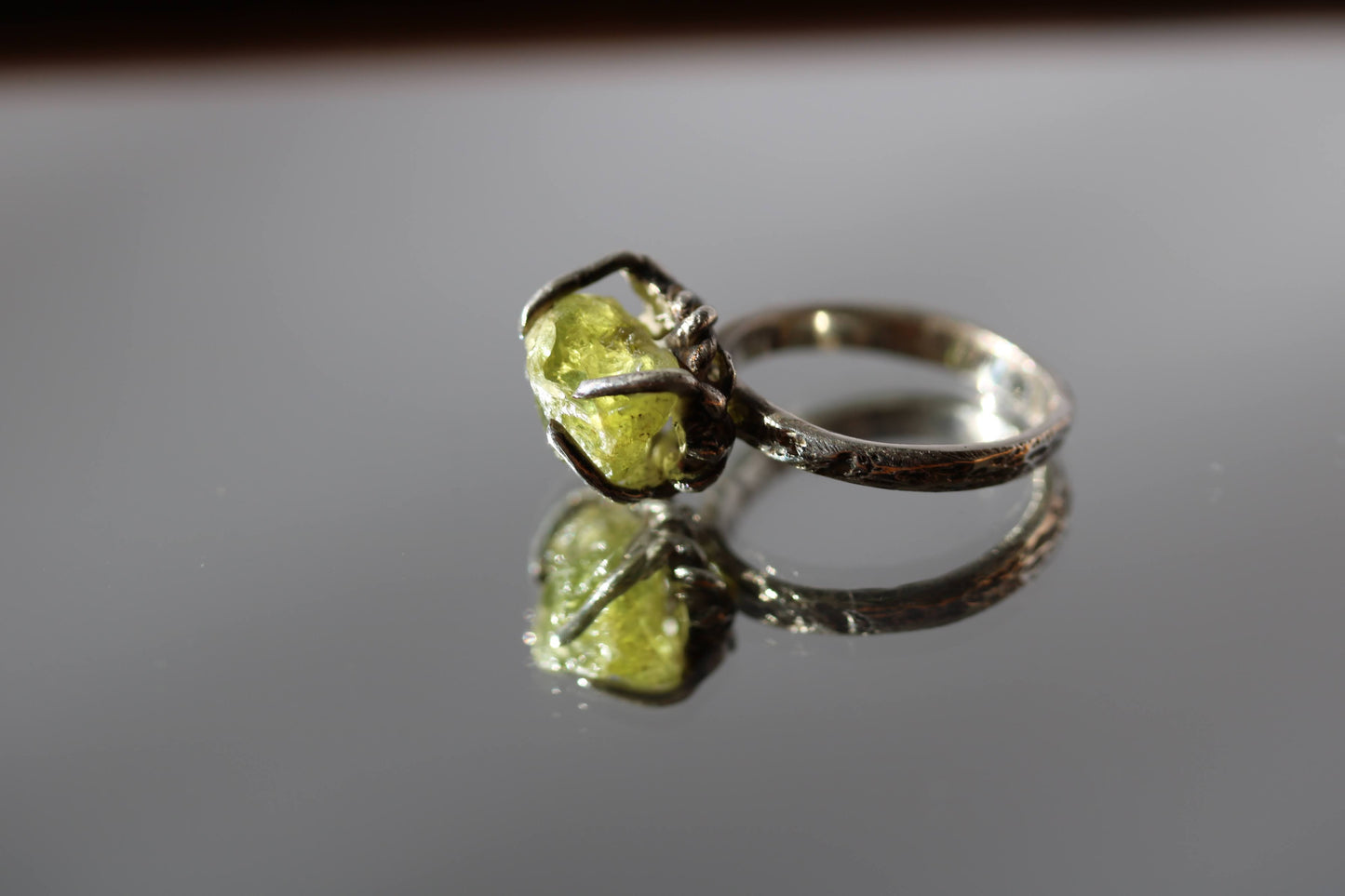 raw peridot ring