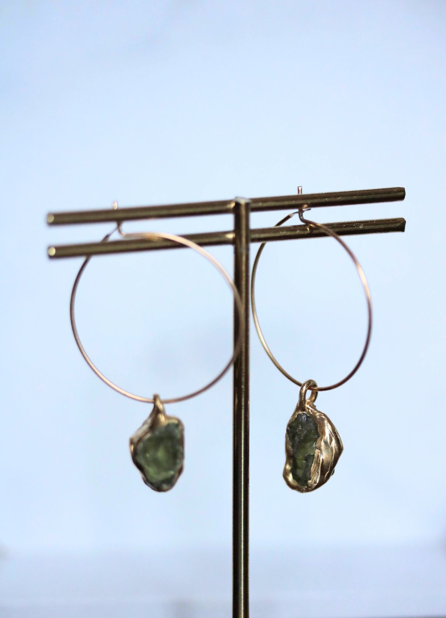 raw peridot hoop earrings