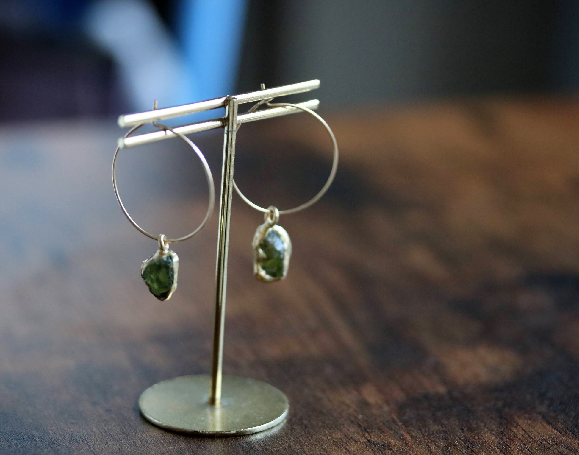 raw peridot gold hoop earrings