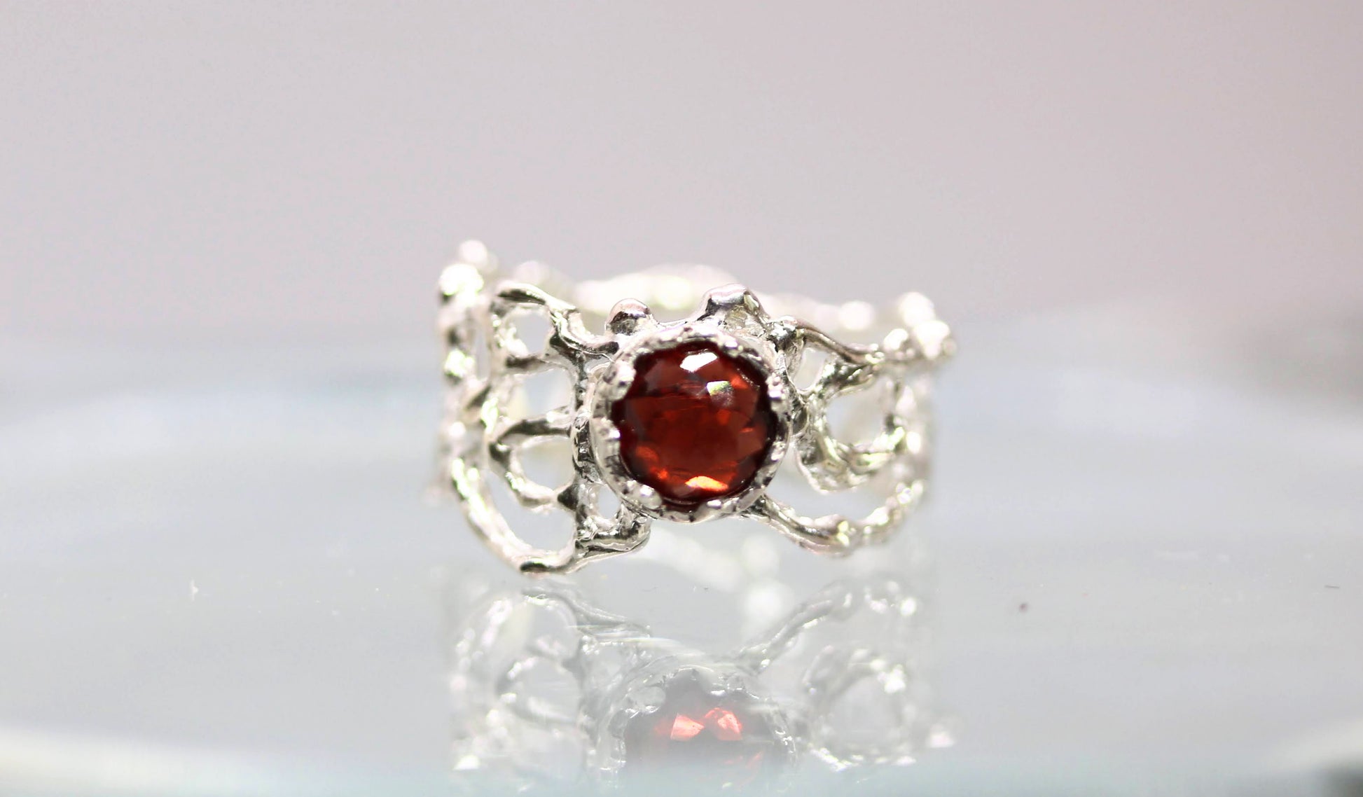 faceted garnet statement ring
