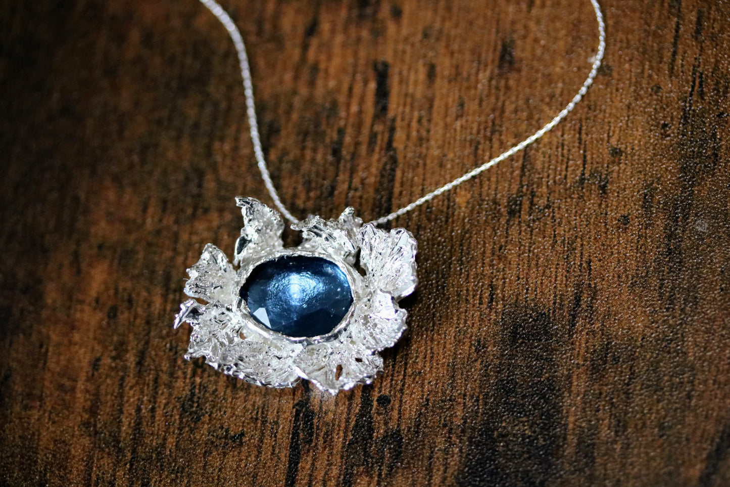 blue stone snowflake silver necklace