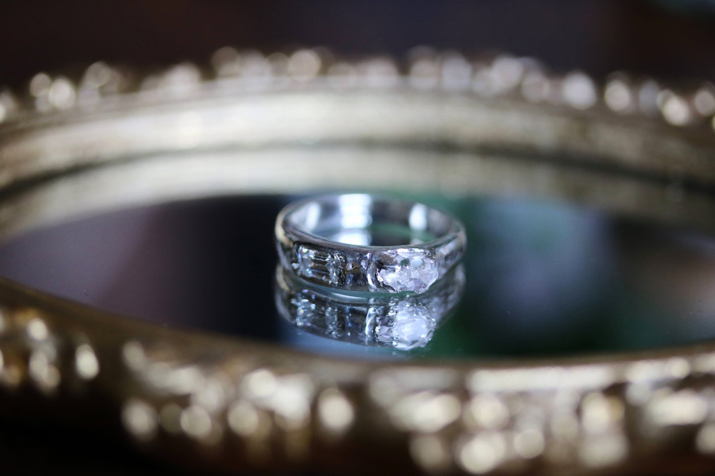 emerald cut diamond and rough diamond ring