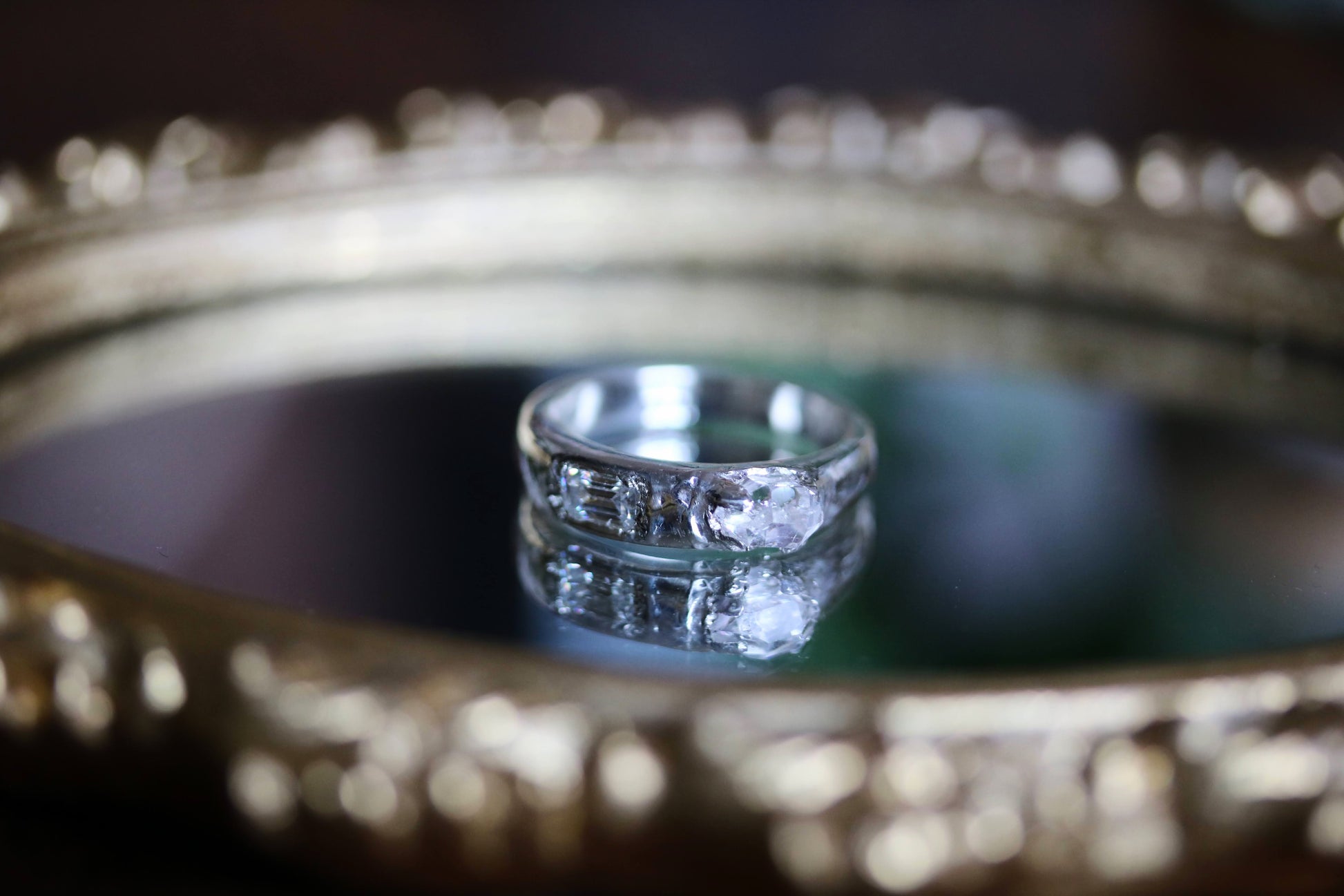 emerald cut diamond and rough diamond ring