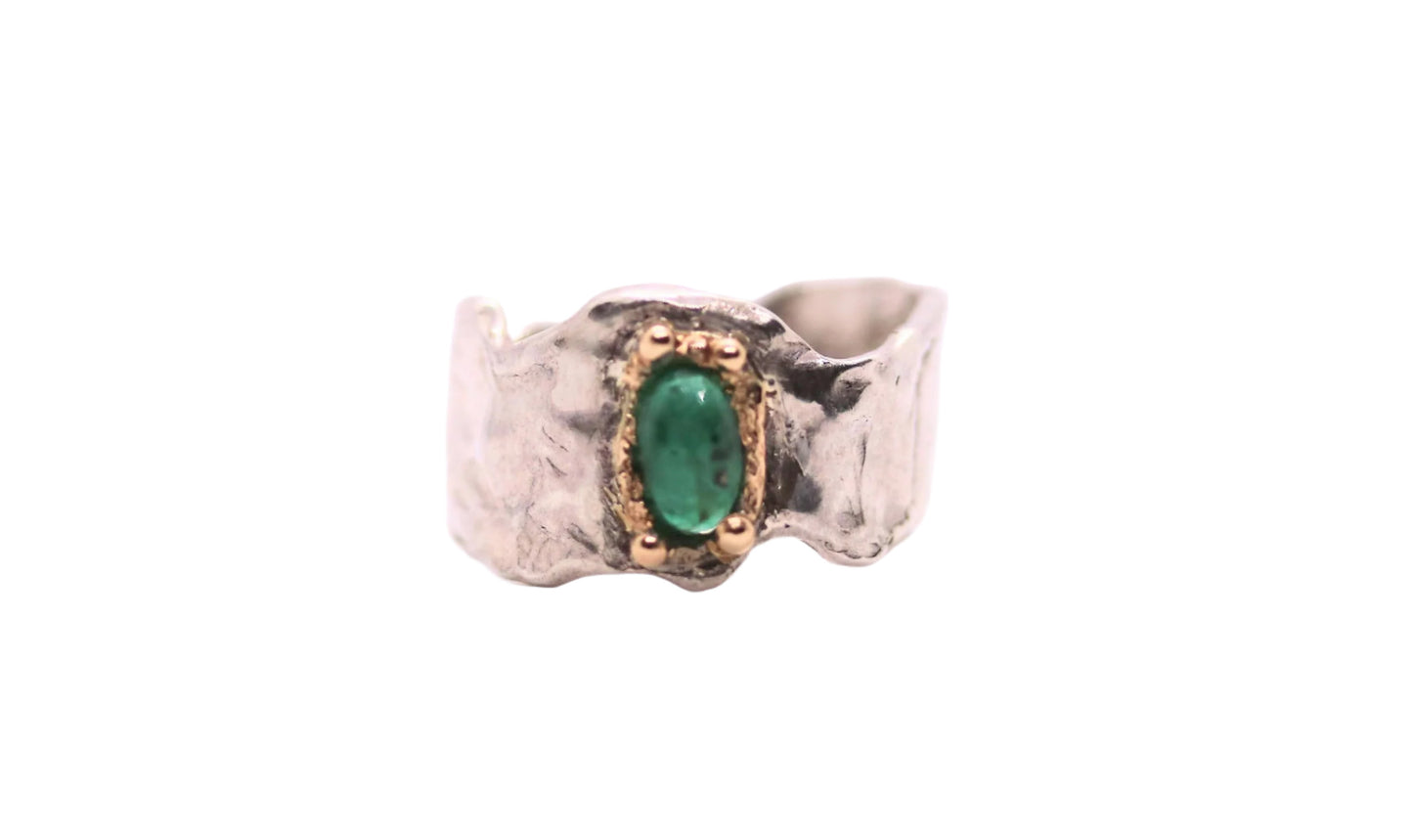 emerald with gold silver ring
