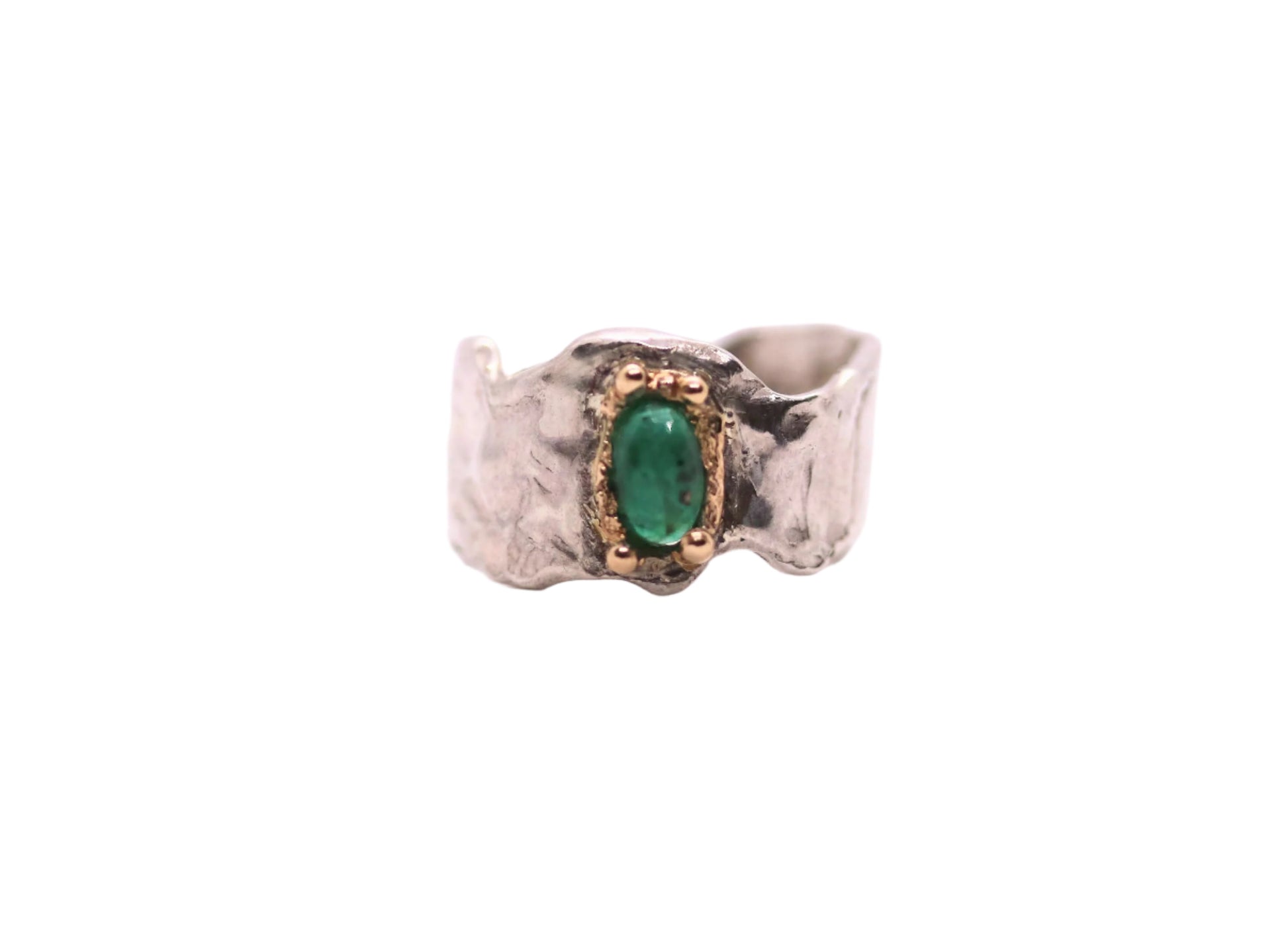 silver emerald with gold and silver ring
