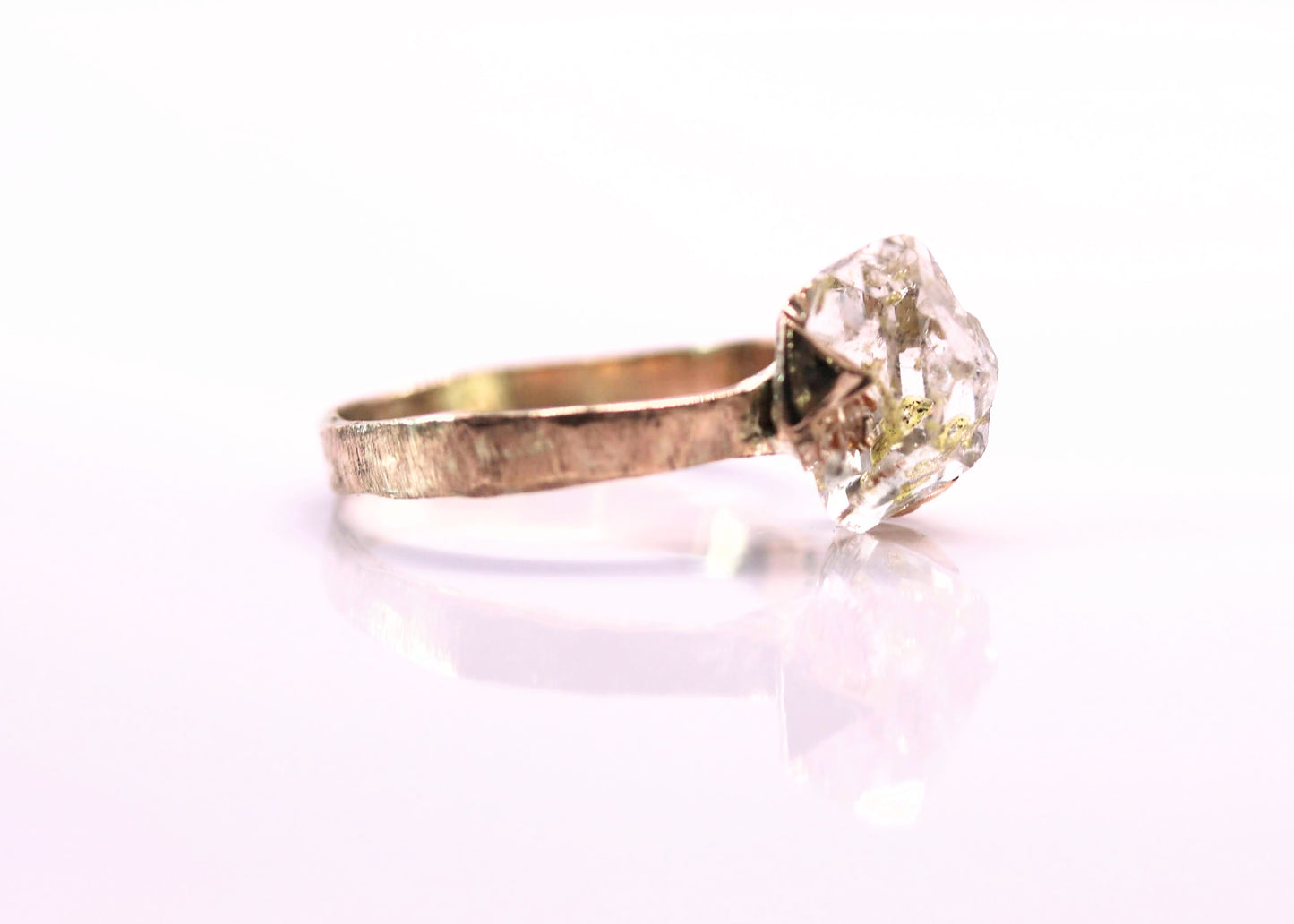 oil in quartz gold ring