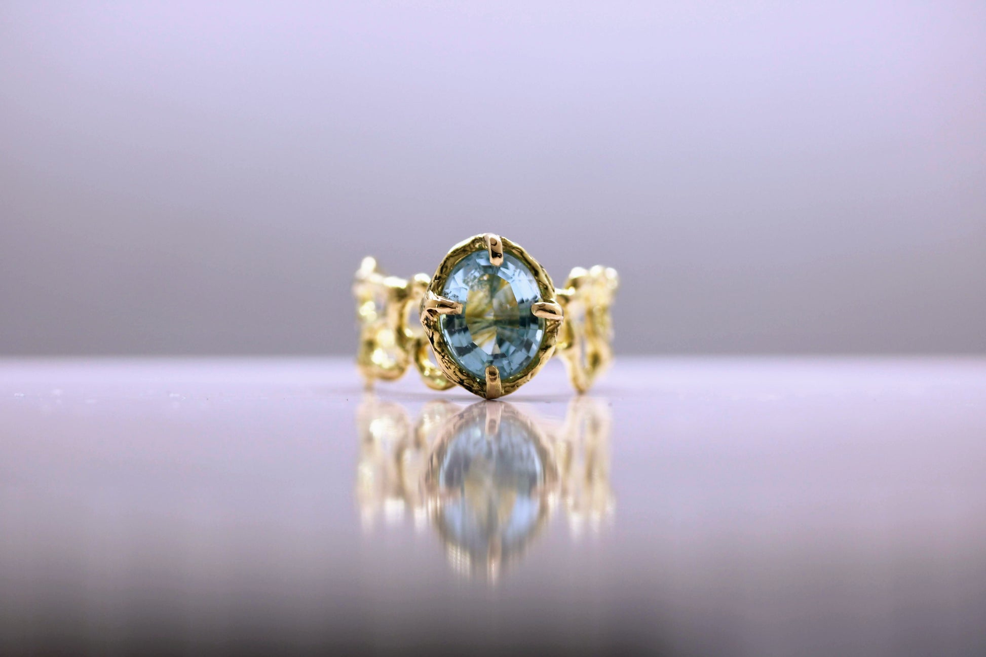 oval blue topaz gold statement ring
