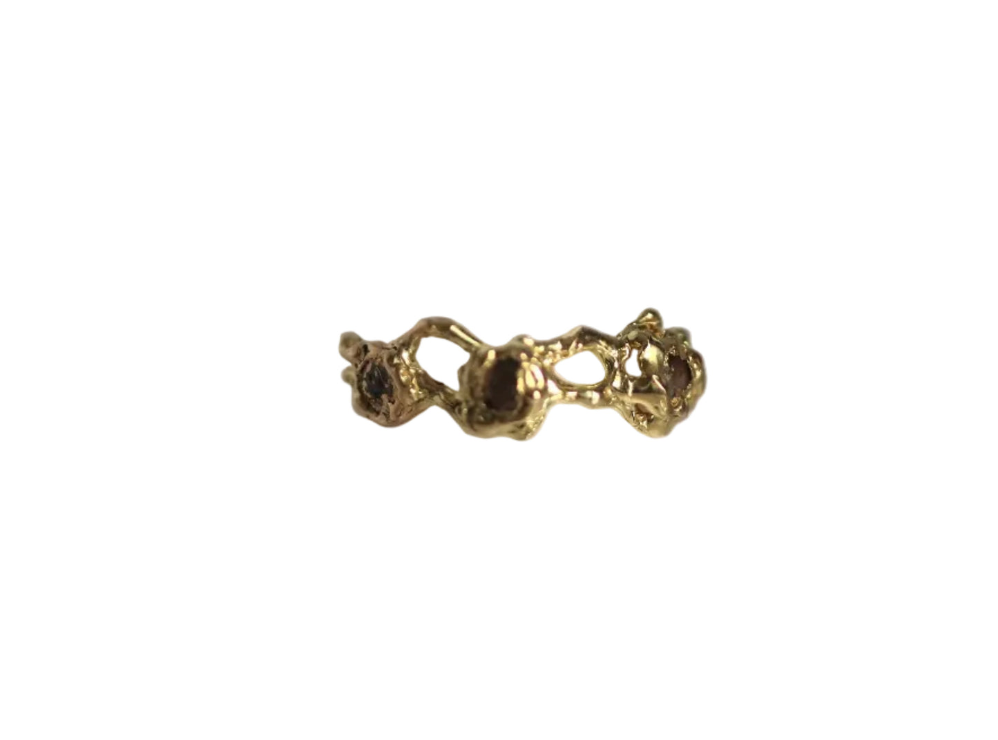 gold ring with three gray diamonds