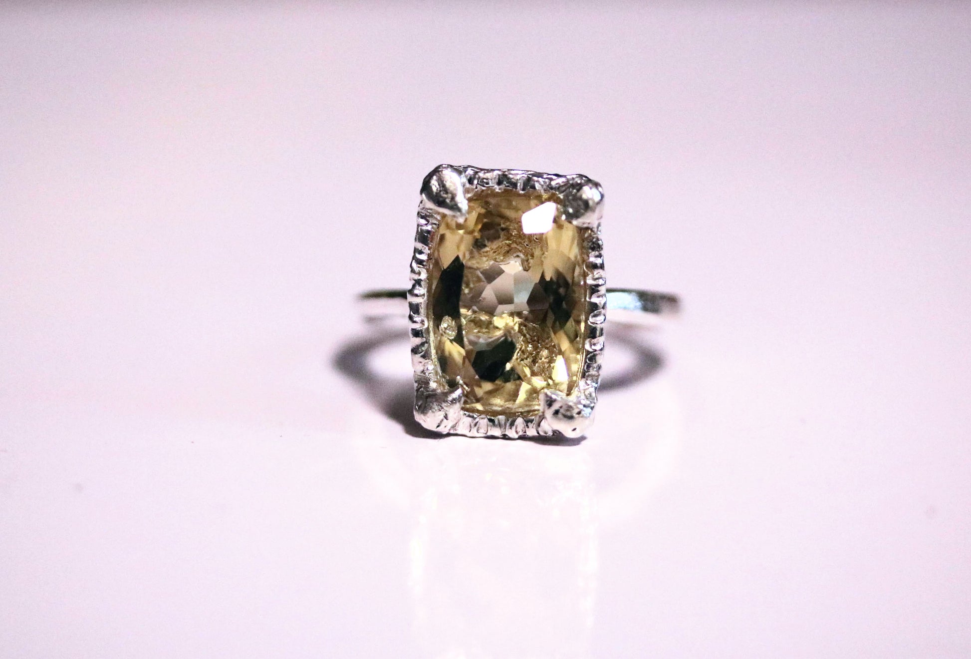 large yellow stone engagement ring