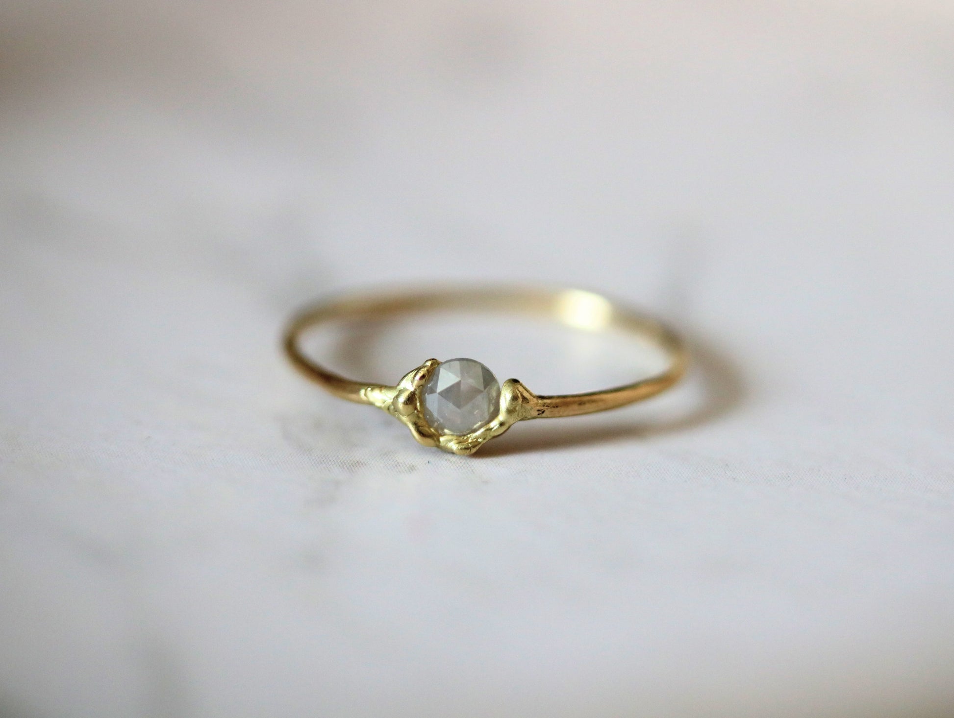 thin gold ring with diamond