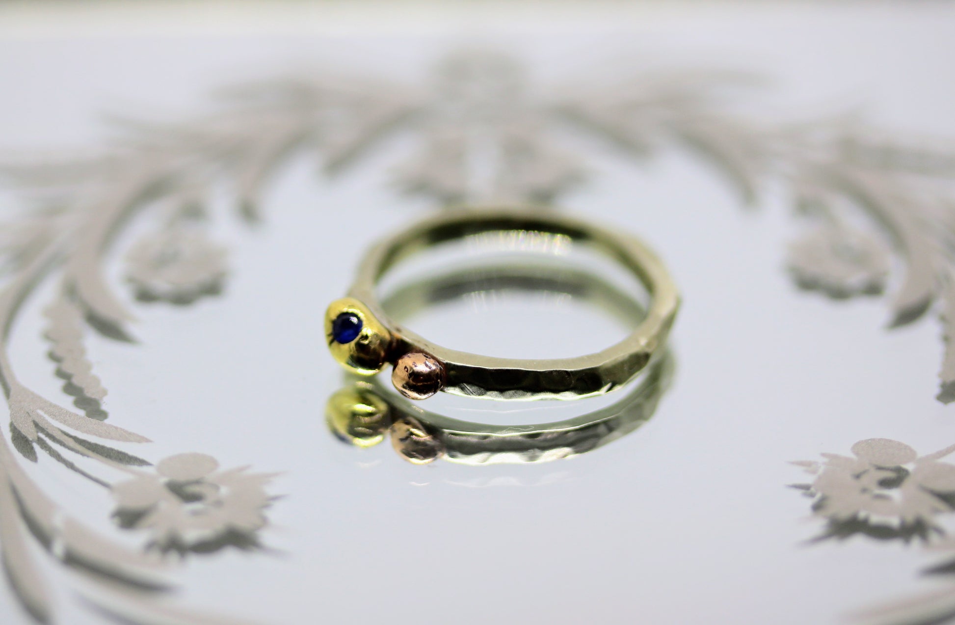 mixed gold ring with sapphire