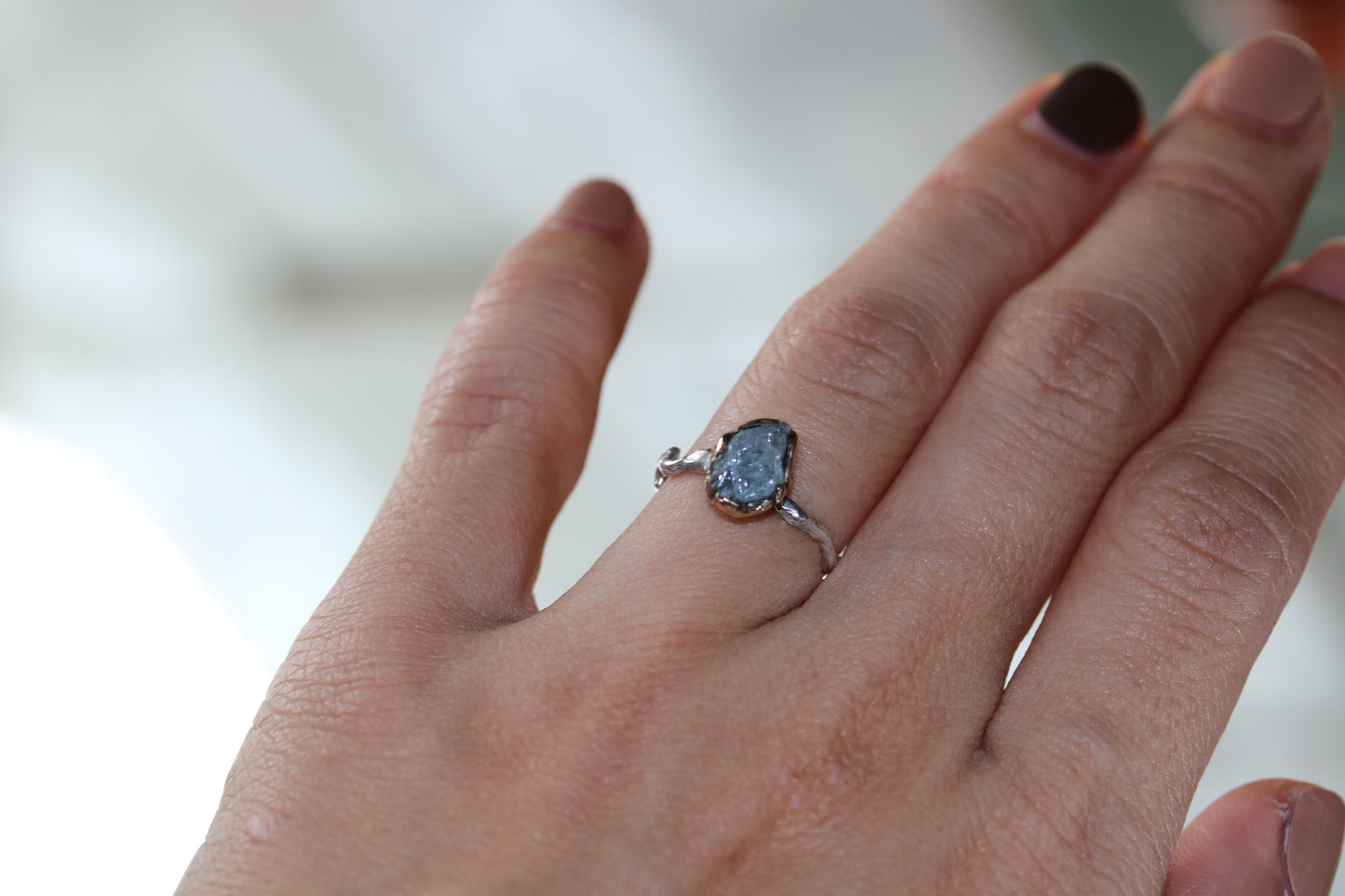 tiny aquamarine solitaire ring