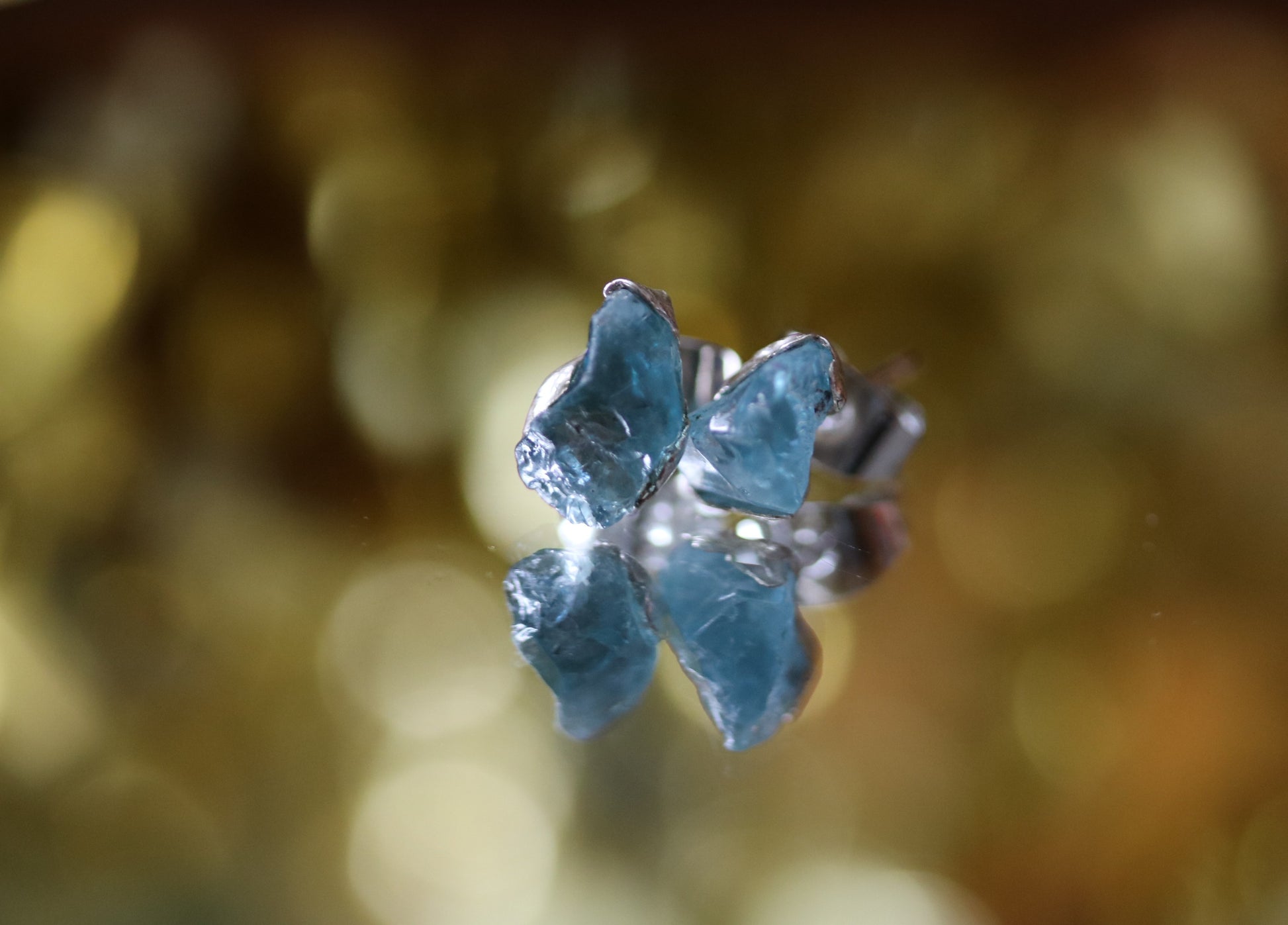 one of a kind raw zircon stud earrings