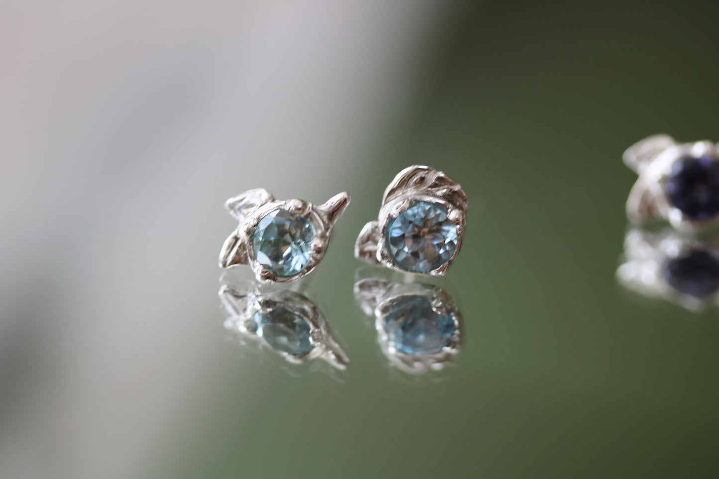 faceted blue topaz studs