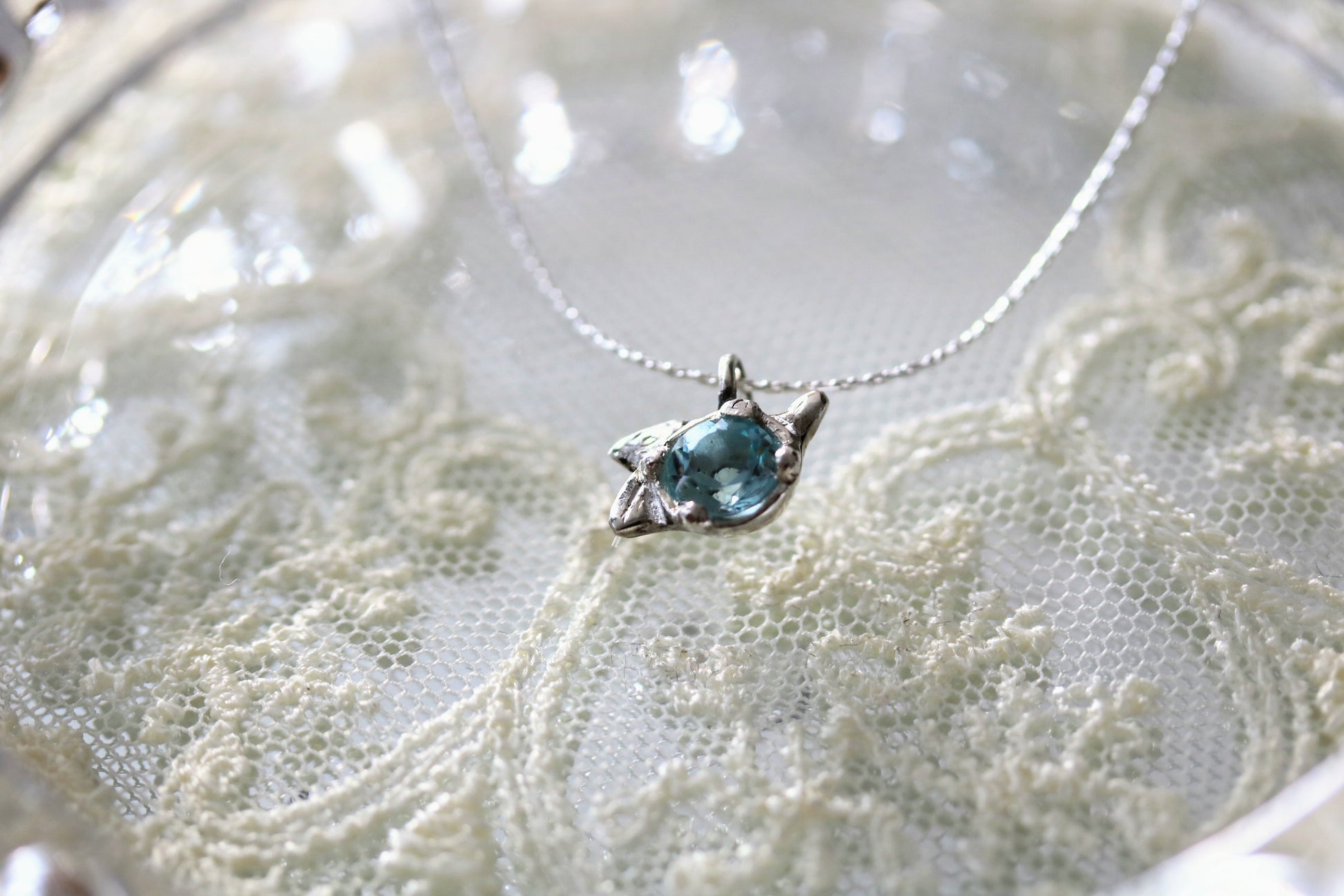 delicate floral blue topaz pendant