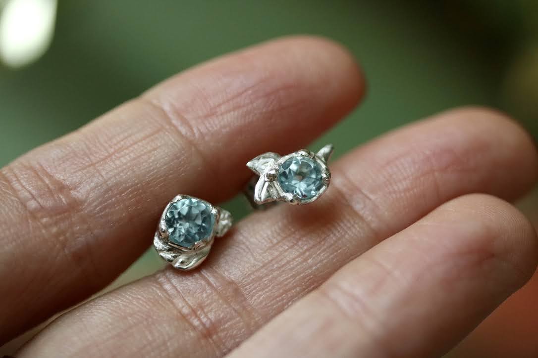 small silver blue topaz studs