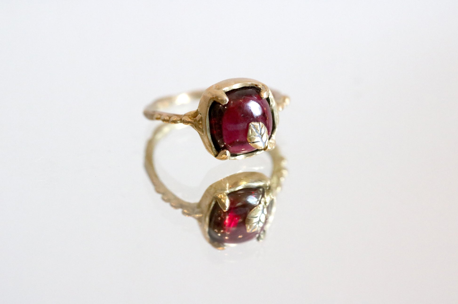 garnet solitaire ring