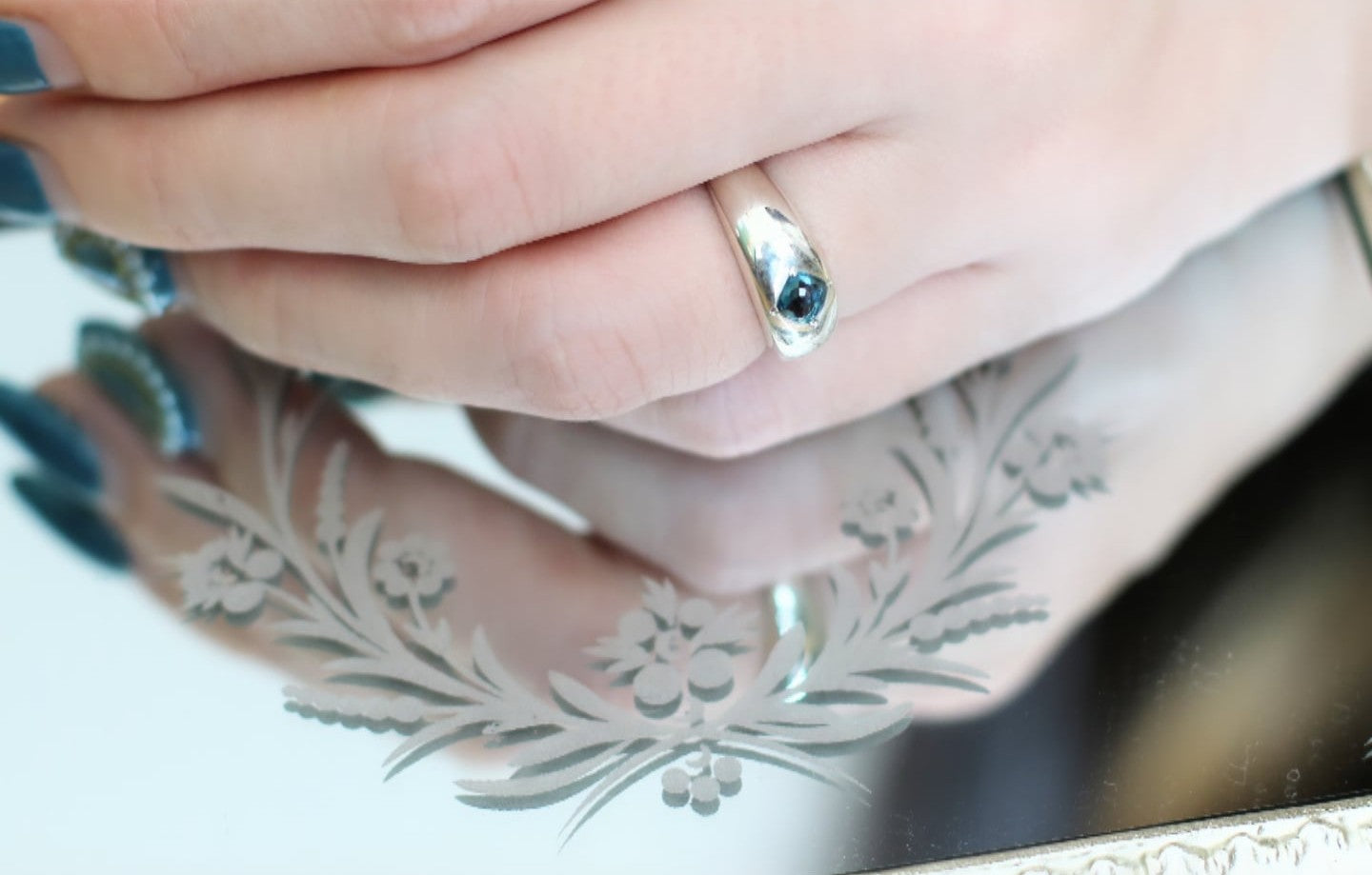 voluminous silver ring with gem stone