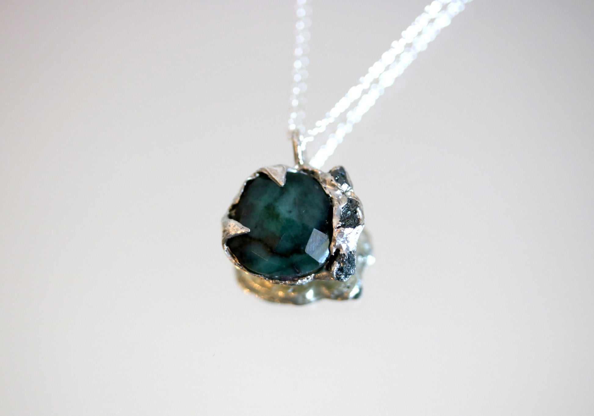 columbia emerald with raw blue diamond necklace