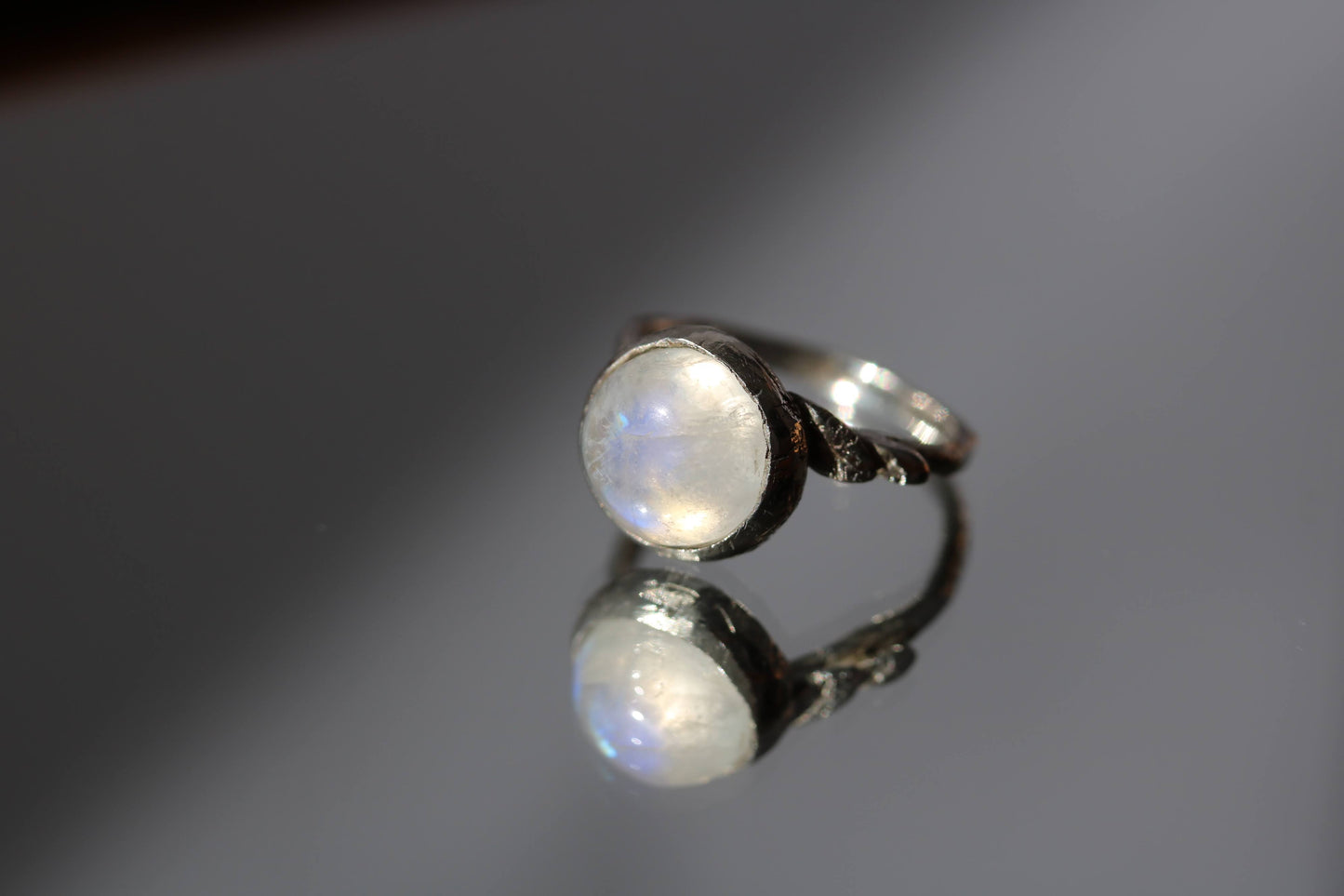 round moonstone solitaire ring