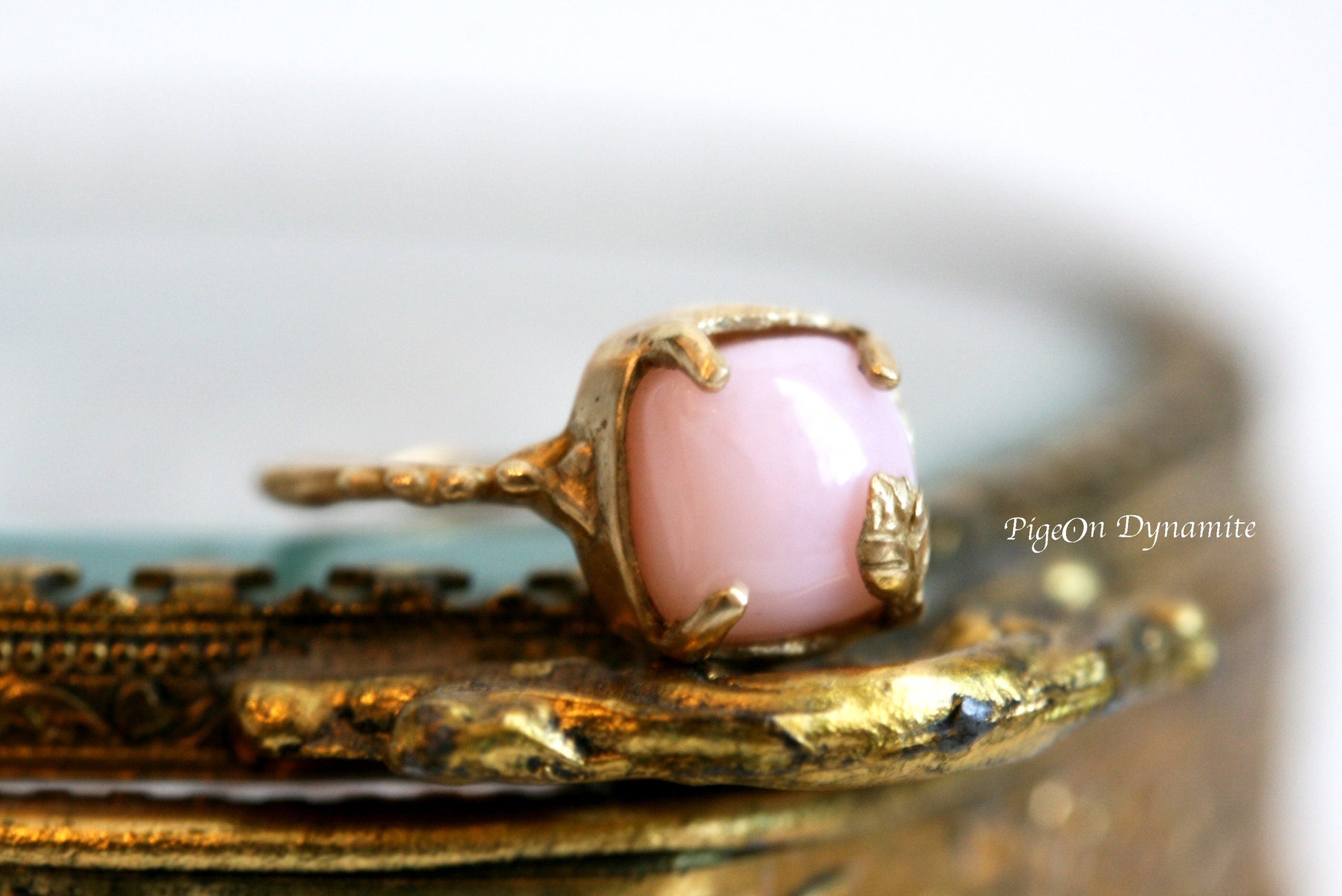 pink opal solitaire ring