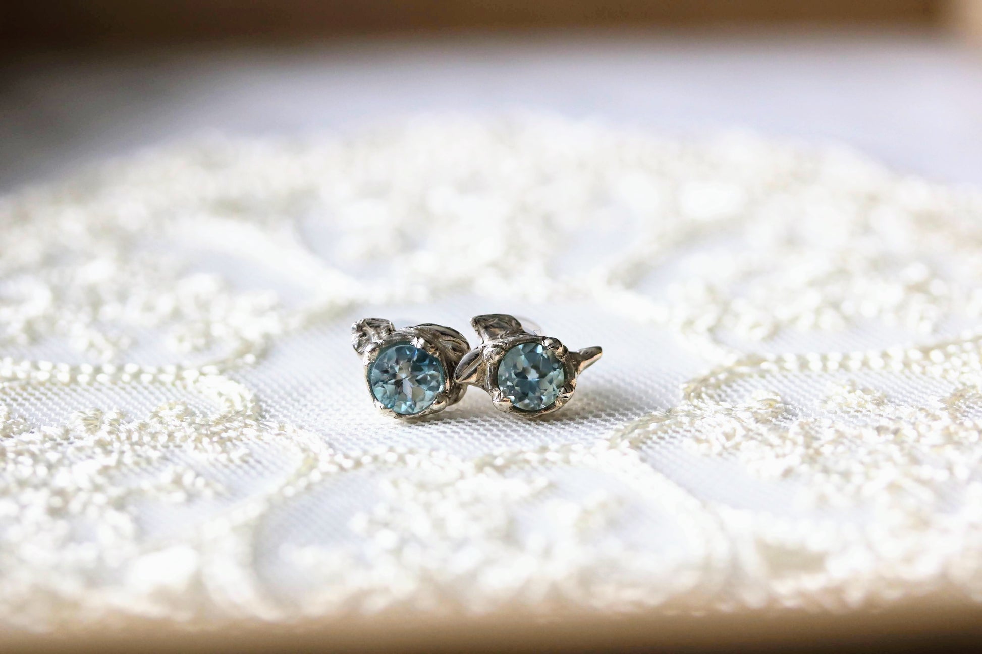 blue topaz flower buds silver earrings