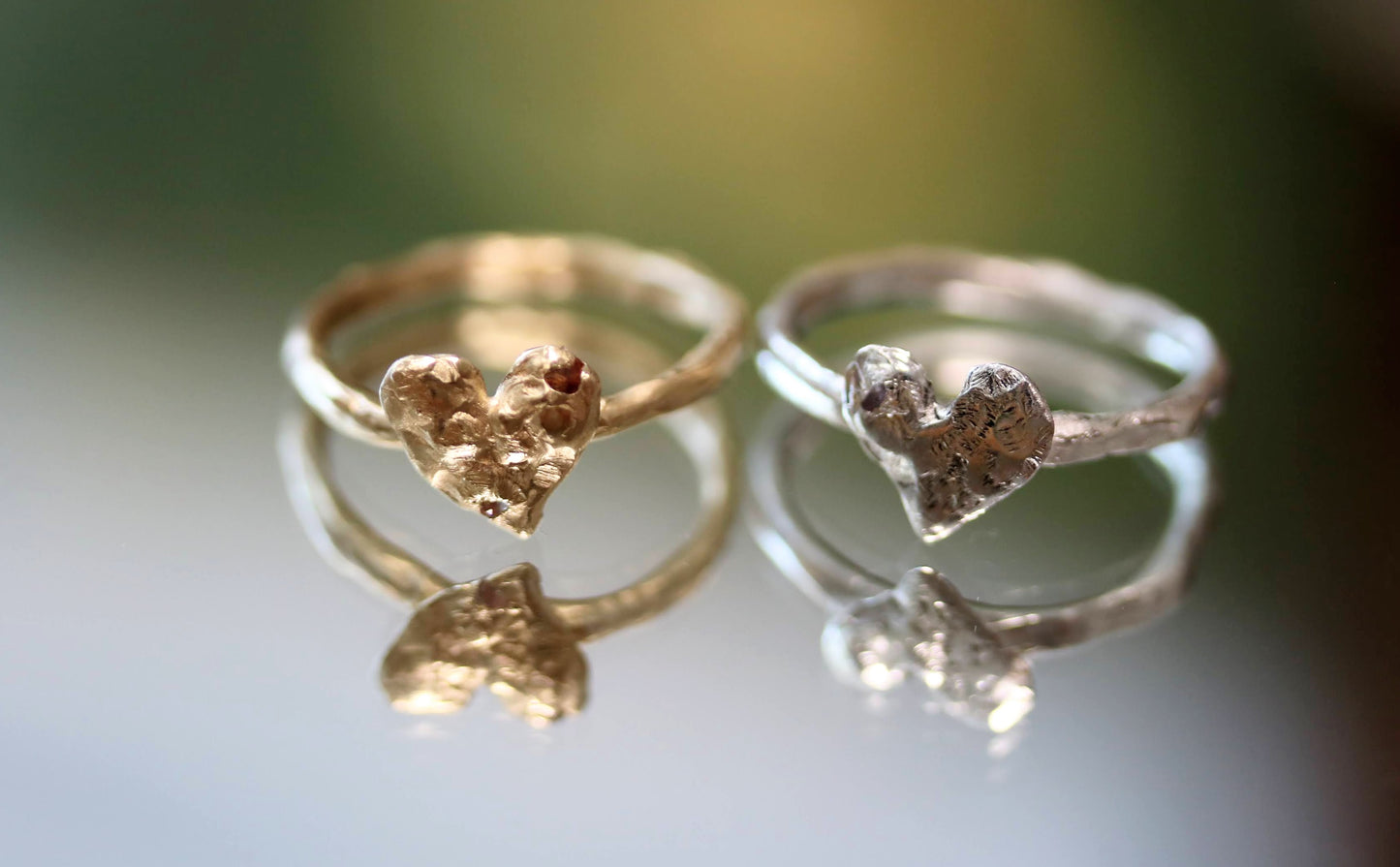 ruby gold heart ring and sapphire silver ring