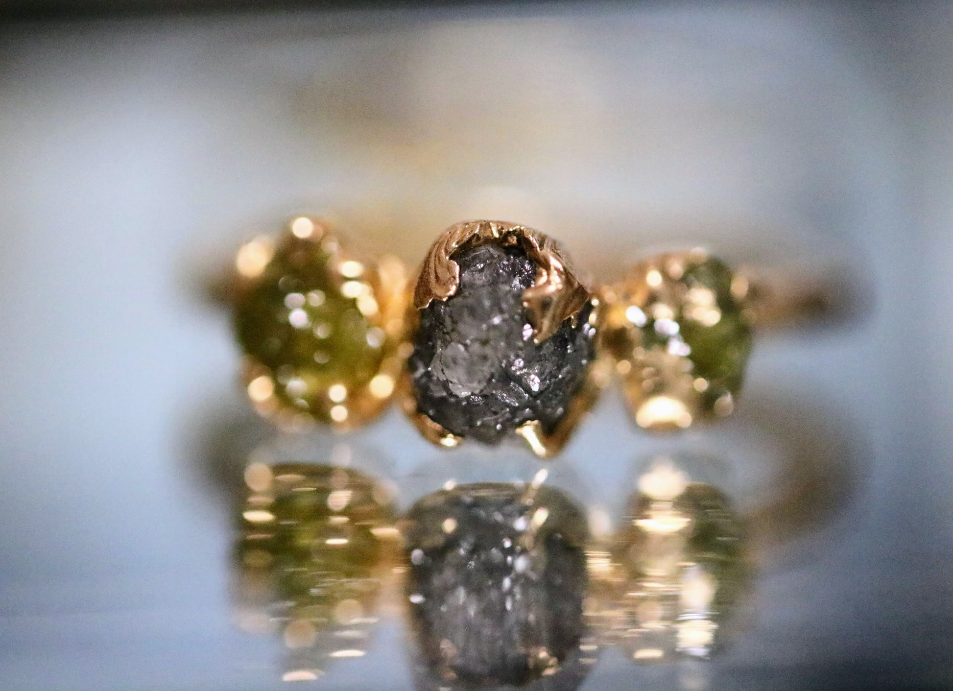 raw diamond three stone gold ring