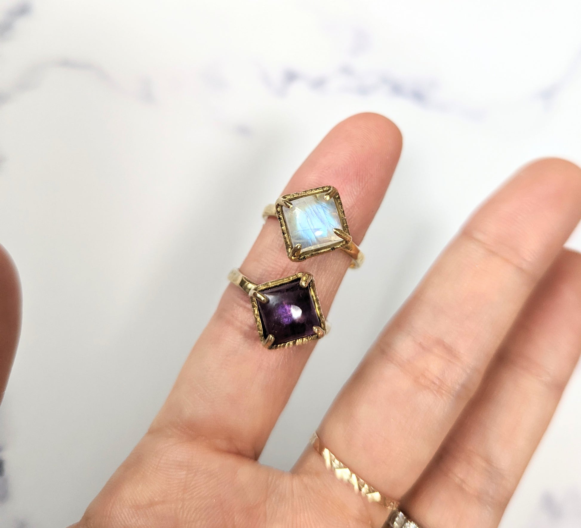 rainbow moonstone and amethyst rings